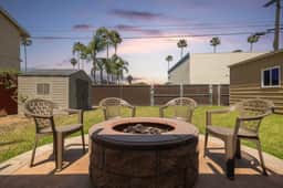 Walk to the Beach! Private Backyard and Fire Pit - Image 4