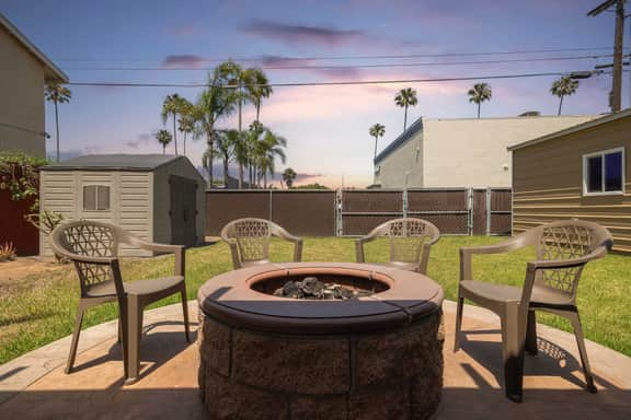 Walk to the Beach! Private Backyard and Fire Pit - Image 4